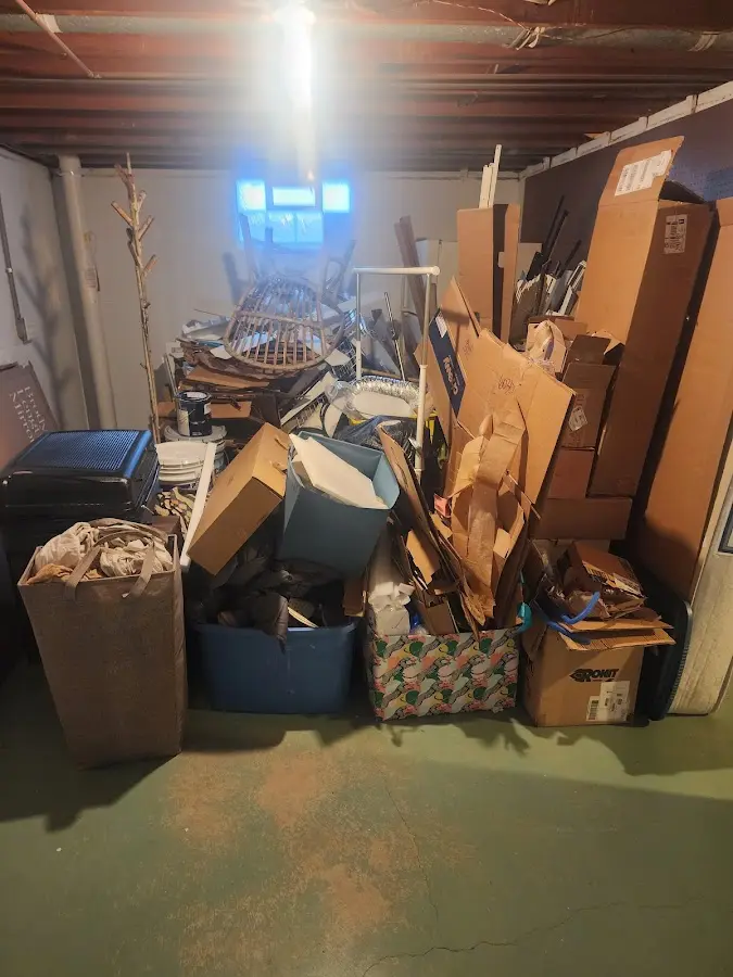 Roll-off dumpster container at job site for 2 Yard Dumpster Rental in Oak Point